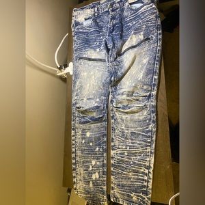 Flashy paint splattered wavy designed blue jeans